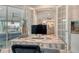 Home office with French doors leading to an outdoor living space and a view into other rooms at 8668 Sundance Loop, Sarasota, FL 34238