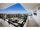 Condo balcony with a view of pool, tennis court, shuffleboard and the ocean at 8735 Midnight Pass Rd # 602B, Sarasota, FL 34242