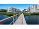 Charming condominium complex with a wooden bridge and beautiful water views at 8735 Midnight Pass Rd # 602B, Sarasota, FL 34242