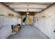 Spacious garage with ample storage shelving and room for multiple vehicles or recreational equipment at 8735 Midnight Pass Rd # 602B, Sarasota, FL 34242
