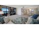 Spacious living room with balcony access, adjacent dining area, and comfortable seating with natural light at 8735 Midnight Pass Rd # 602B, Sarasota, FL 34242