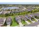An attractive home in a well-planned community offers serene pond views and manicured landscaping at 8985 Royal River Cir, Parrish, FL 34219