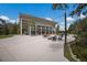 Inviting outdoor community area featuring ample seating and lush landscaping in a relaxing setting in Florida at 8985 Royal River Cir, Parrish, FL 34219