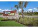 Welcoming entrance sign for Camp Creek, set among well-maintained landscaping, in Florida at 8985 Royal River Cir, Parrish, FL 34219