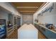 Well-appointed kitchenette featuring sleek appliances, ample counter space, and stylish wood and marble finishes at 8985 Royal River Cir, Parrish, FL 34219