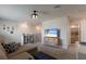 Well-lit room featuring comfortable seating, and a television at 8985 Royal River Cir, Parrish, FL 34219