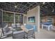 Relaxing recreation room with a seating area and various game tables for residents and guests at 8985 Royal River Cir, Parrish, FL 34219