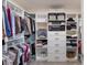 The well-organized walk-in closet offers generous storage with shelving and drawers, ensuring a clutter-free space at 8985 Royal River Cir, Parrish, FL 34219