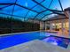 A lovely screened-in pool, complete with an attached spa, perfect for relaxation and fun at 10120 Carnoustie Pl, Bradenton, FL 34211
