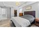 Relaxing bedroom with a ceiling fan and spacious closet at 1107 22Nd E St, Palmetto, FL 34221