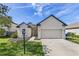 Inviting single story home with well-maintained front yard and attached garage at 1107 22Nd E St, Palmetto, FL 34221