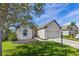 Charming single-Gathering home featuring manicured lawn and a two-car garage at 1107 22Nd E St, Palmetto, FL 34221