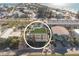 Aerial view of charming multi-story home featuring a rooftop terrace with scenic views at 111 6Th N St, Bradenton Beach, FL 34217