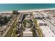 Breathtaking aerial view of beachfront property with rooftop deck and inviting pool at 111 6Th N St, Bradenton Beach, FL 34217