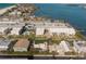 Stunning aerial perspective of waterfront home with private pool and rooftop terrace at 111 6Th N St, Bradenton Beach, FL 34217
