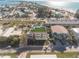 An aerial view of a beachfront home with a rooftop patio, showcasing its location near the water at 111 6Th N St, Bradenton Beach, FL 34217
