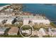 Stunning aerial perspective of waterfront home with private pool and rooftop terrace at 111 6Th N St, Bradenton Beach, FL 34217