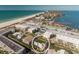 Panoramic aerial shot featuring a coastal home with a rooftop deck near the beach at 111 6Th N St, Bradenton Beach, FL 34217