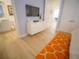 Bright bedroom showcasing stylish decor, including a patterned rug and a white dresser at 111 6Th N St, Bradenton Beach, FL 34217