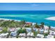 Magnificent aerial shot of the house near the coast, offering panoramic views of the ocean at 1168 Westway Dr, Sarasota, FL 34236