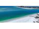 Expansive beach view showcasing turquoise waters and a long stretch of white sand near beachfront properties at 1168 Westway Dr, Sarasota, FL 34236