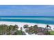 Tranquil beach view with clear blue waters and white sandy shoreline, a perfect coastal retreat at 1168 Westway Dr, Sarasota, FL 34236