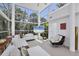 Bright living room with lots of natural light, modern furniture and minimalist styling at 1168 Westway Dr, Sarasota, FL 34236