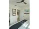 Bright bedroom featuring a comfortable bed, warm decor and a doorway, creating a cozy retreat at 1207 65Th Nw St, Bradenton, FL 34209