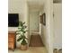 Bright hallway featuring neutral decor, leading to a bedroom door, for easy access at 1207 65Th Nw St, Bradenton, FL 34209