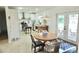 Charming kitchen with dining nook, stainless appliances, ample countertops, and natural light from french doors at 1207 65Th Nw St, Bradenton, FL 34209
