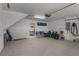 Spacious garage area with storage, an electric car charger and room for recreation at 123 52Nd St # B, Bradenton Beach, FL 34217