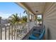 Covered porch has outdoor seating with neighborhood views at 123 52Nd St # B, Bradenton Beach, FL 34217