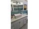 Bathroom featuring a new marble countertop, vessel sink, and updated vanity at 134 Gulfview Rd, Punta Gorda, FL 33950