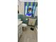 Renovated bathroom featuring wood-look tile, bright paint, and tub-shower combo at 134 Gulfview Rd, Punta Gorda, FL 33950