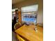 Dining room view showcasing the inviting backyard pool at 134 Gulfview Rd, Punta Gorda, FL 33950