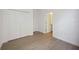 Spacious bedroom with hardwood flooring, closet and white trim at 15127 Oxford Grey Dr, Bradenton, FL 34211