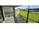 Enjoy the outdoors on this screened-in lanai overlooking a well-maintained lawn with tasteful plantings and a peaceful neighborhood view at 15127 Oxford Grey Dr, Bradenton, FL 34211