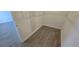 Walk-in closet with hardwood floors and electrical panel on the wall at 15127 Oxford Grey Dr, Bradenton, FL 34211