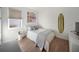 Stylish bedroom featuring natural light, hardwood floors, and unique decor at 17737 Savory Mist Cir, Bradenton, FL 34211