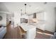Bright kitchen with stainless steel appliances and a large island with seating at 17737 Savory Mist Cir, Bradenton, FL 34211