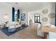 Clubhouse lounge with stylish seating, decor, and plenty of natural light at 17737 Savory Mist Cir, Bradenton, FL 34211