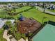 A neighborhood playground features swings, slides, and ample space for to play at 17737 Savory Mist Cir, Bradenton, FL 34211