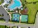 Community amenities showcase tennis and basketball courts next to a neighborhood pool at 17737 Savory Mist Cir, Bradenton, FL 34211
