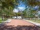 Community common area with walking paths and greenery, inviting residents to enjoy outdoor activities at 2217 Muesel St, Sarasota, FL 34237