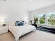 Bright main bedroom features large windows and exercise equipment at 2217 Muesel St, Sarasota, FL 34237