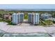 Breathtaking view of beachfront condos, pristine beach, and golf course with waterfront views on Longboat Key at 2295 Gulf Of Mexico Dr # 64S, Longboat Key, FL 34228