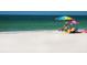 Beautiful white sand beach with turquoise ocean water, perfect for relaxation at 2295 Gulf Of Mexico Dr # 64S, Longboat Key, FL 34228