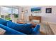 Cozy living room with ocean view, showcasing stylish furniture and decor elements at 2295 Gulf Of Mexico Dr # 64S, Longboat Key, FL 34228