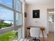 Desk area has a view of the beach, lawn, and water at 2295 Gulf Of Mexico Dr # 64S, Longboat Key, FL 34228