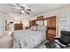 Comfortable bedroom featuring a ceiling fan, and a private bathroom at 2381 Appaloosa Cir, Sarasota, FL 34240
